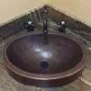 17‚Ä≥ Oval Skirted Vessel Hammered Copper Sink