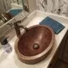 17‚Ä≥ Oval Skirted Vessel Hammered Copper Sink