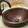 17‚Ä≥ Oval Skirted Vessel Hammered Copper Sink