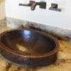 18‚Ä≥ Oval Skirted Vessel Hammered Copper Sink