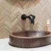 18‚Ä≥ Oval Skirted Vessel Hammered Copper Sink