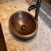 18‚Ä≥ Oval Skirted Vessel Hammered Copper Sink